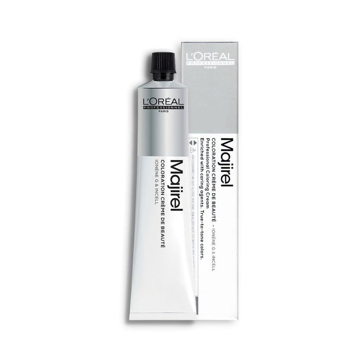 Professional stylist applying Majirel 5.52 on client